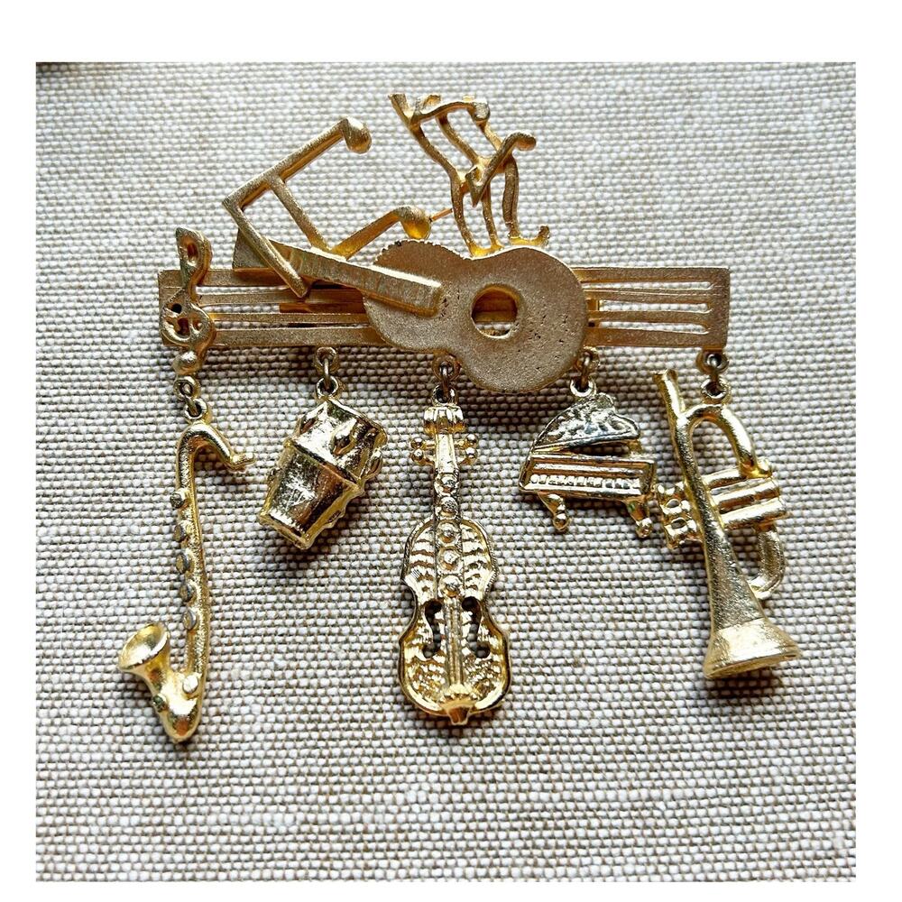 Vintage Ultracraft Music Brooch Gold Tone Signed w Sax Horn Piano Charms